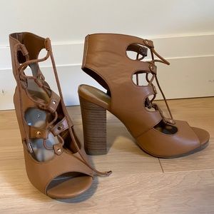Brand new, never worn 4 inch lace up block heels